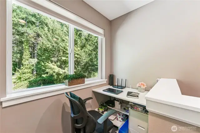Desk tucked away on upstairs landing is the perfect spot to work