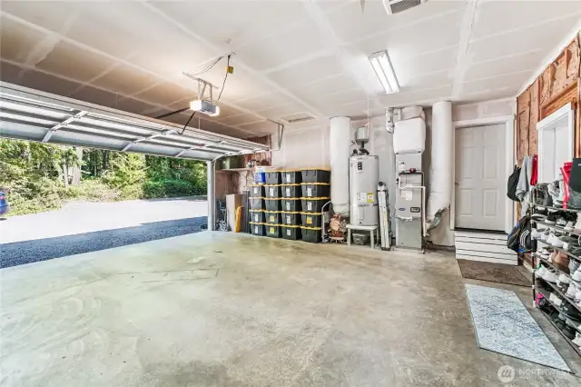 Neat as a pin garage with heat pump and hot water heater