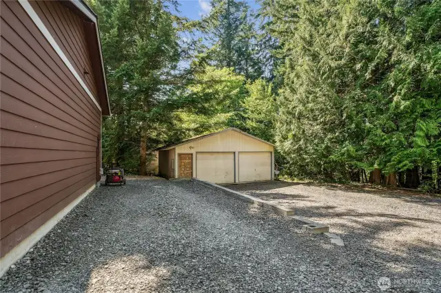 Separate 2 car garage could be excellent shop.  See generator hook up here