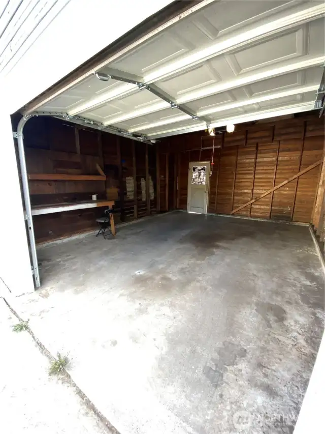 Looking into garage from ally