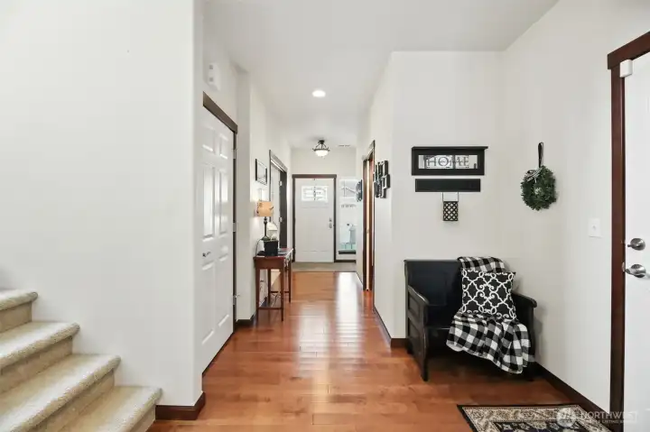 Entry hall that leads to second floor loft and 2 additional bedrooms for guests or craft room space