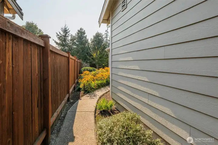 Side walk way to the back yard