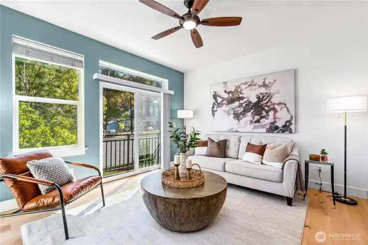 Peaceful views of nature and plenty of natural light from the huge southern facing window and sliding glass door.