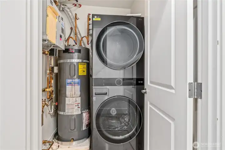 Who knew laundry and utilities could feel this slick? Start your wash from your phone (yep, really!) with the 2022 WiFi-enabled LG washer & dryer—because laundry day deserves a smart upgrade. A 2021 Ruud 50-gallon electric water heater keeps hot water flowing, while the Slantfin boiler powers cozy radiant floors (so no furnace or dusty ducts to deal with). And yes, even with all that muscle, there’s still space to stash your hamper or folding basket.