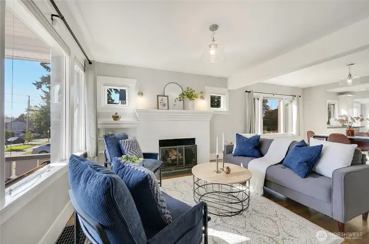 The fireplace is a classy touch and focal point to this great space.
