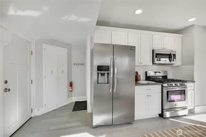 Extra storage on the left, the stairs to the basement are also there.