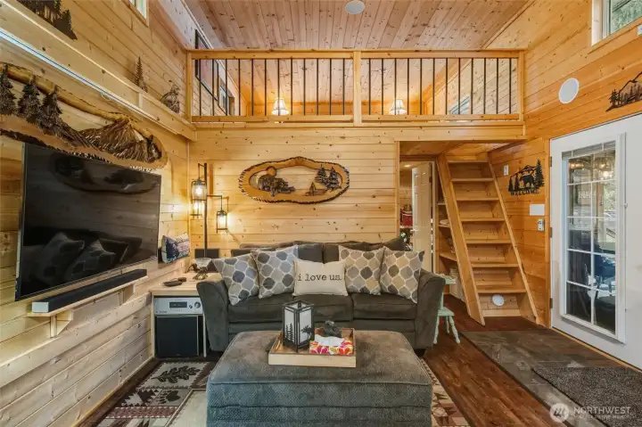 View of living room with loft.
