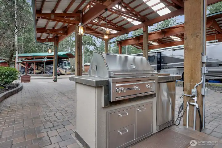 BBQ HOOKED TO IN GROUND PROPANE TANK