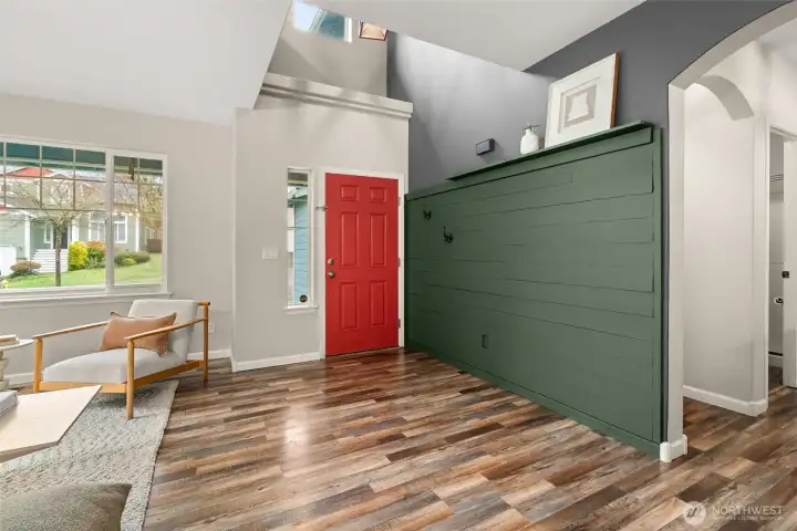 Entry with vaulted ceilings to second floor.