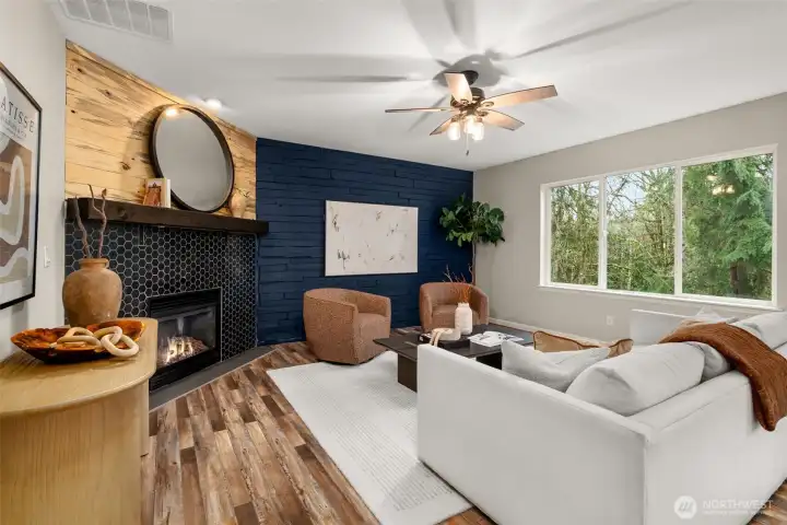 The family room is located off the kitchen and great for relaxing, entertaining, and more.