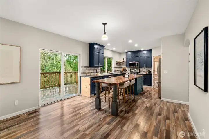 The custom kitchen island is not to be missed! Great for hosting, food prep, and a gathering table to share a meal.