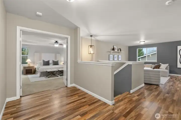 The 2nd story hosts all 4 bedrooms, a bonus room with additional desks.