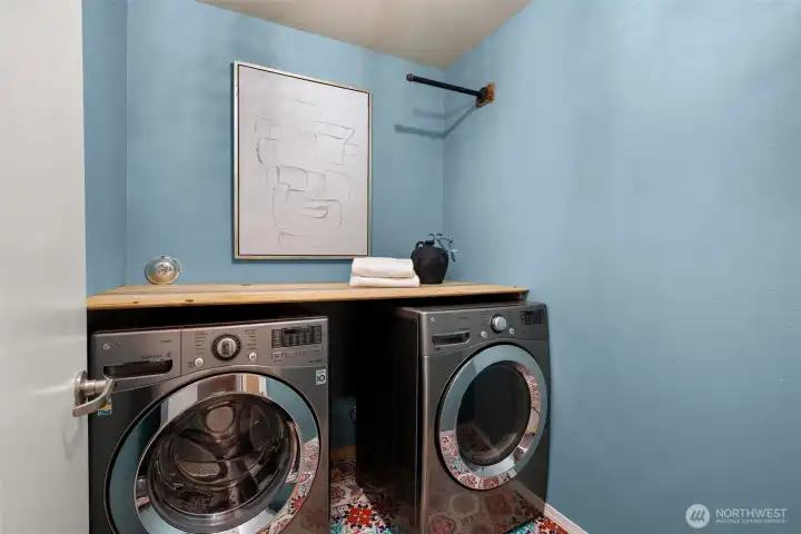 Don't miss this laundry room. It's designed to inspire and fuel your with energy to accomplish all your goals!