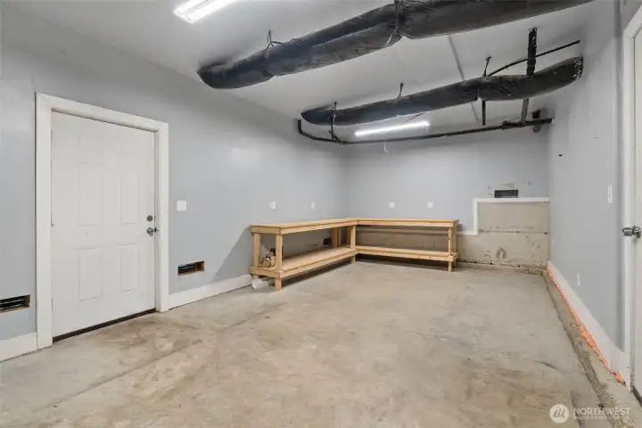 The additional 480 square feet of unfinished square footage is accessed by using the exterior stairs or side yards. This workspace includes a 220W and has been used as a workspace for the current and former owners.