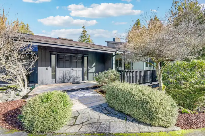 The front entry has easy access. Note there is all new decking, new roof, new exterior paint, and improved landscaping.