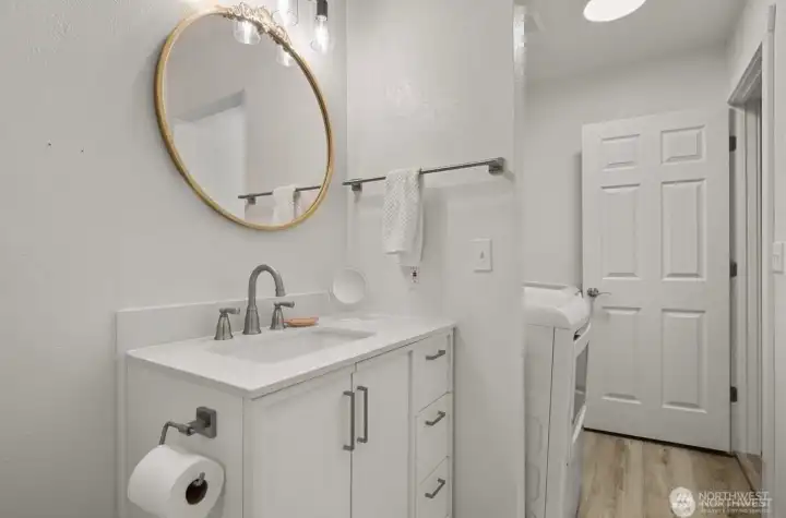 Laundry room with 1/2 bath on lower level