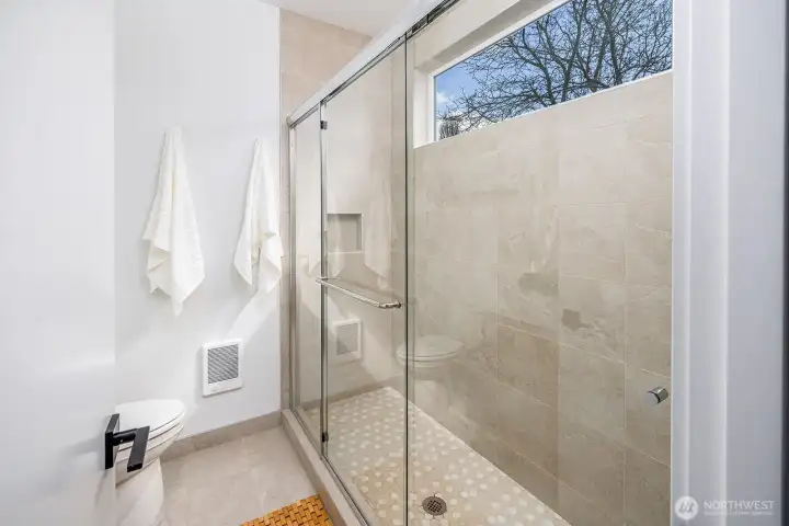 Large full tiled shower in primary bathroom. **staged unit B**