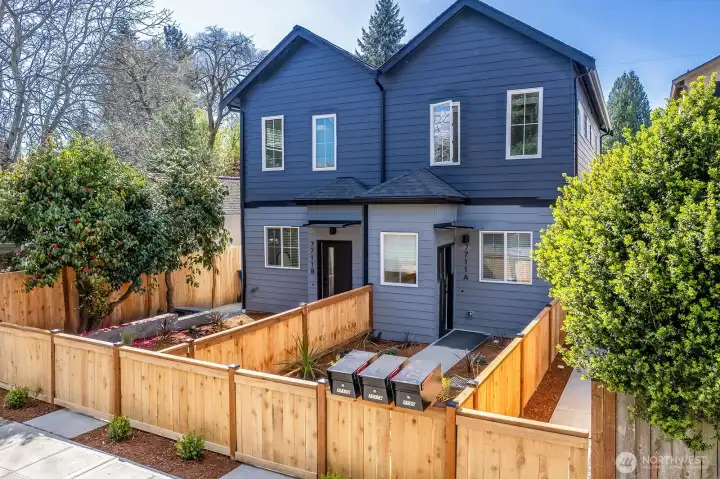 Fully fenced front and back yard with easy, well lit access.