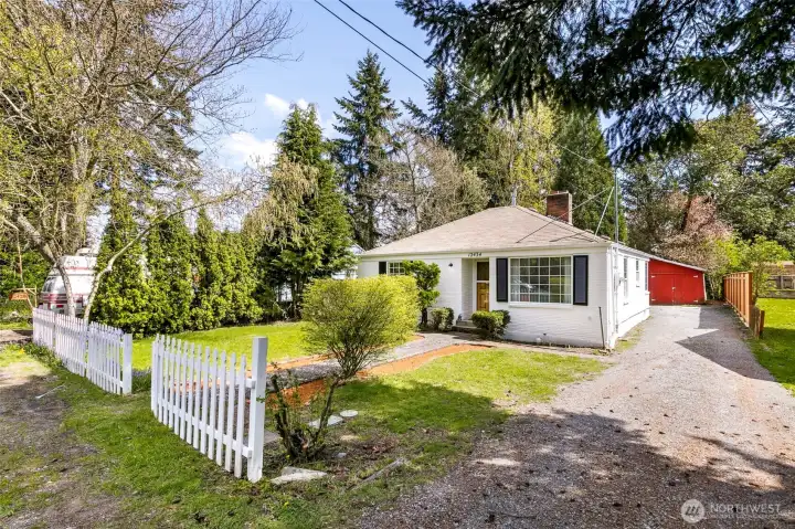 VIew from the driveway it goes back around the corner to the shop & back yard areas