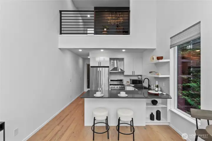 View of kitchen with mezzanine loft level