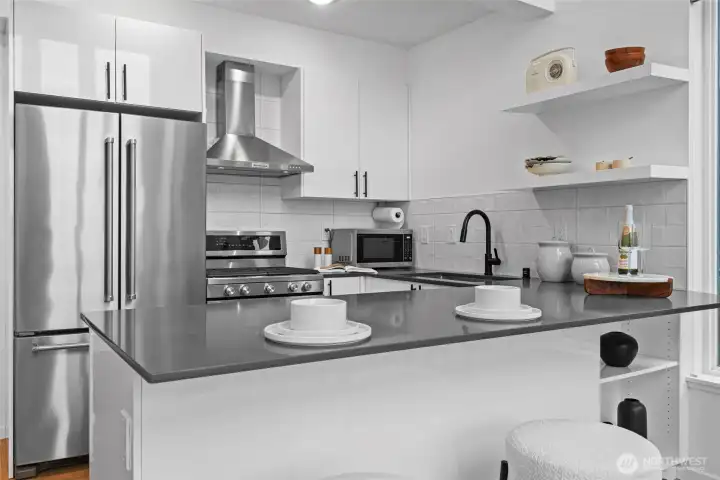 Kitchen is well designed with plenty of cabinet space