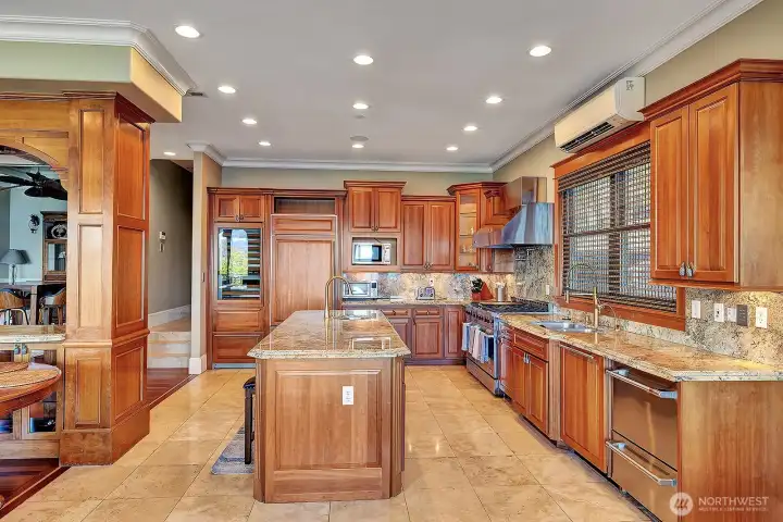 Heated travertine floors in the kitchen with new appliances