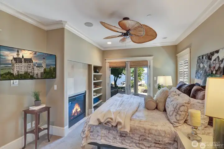 Primary bedroom with double side gas fireplace