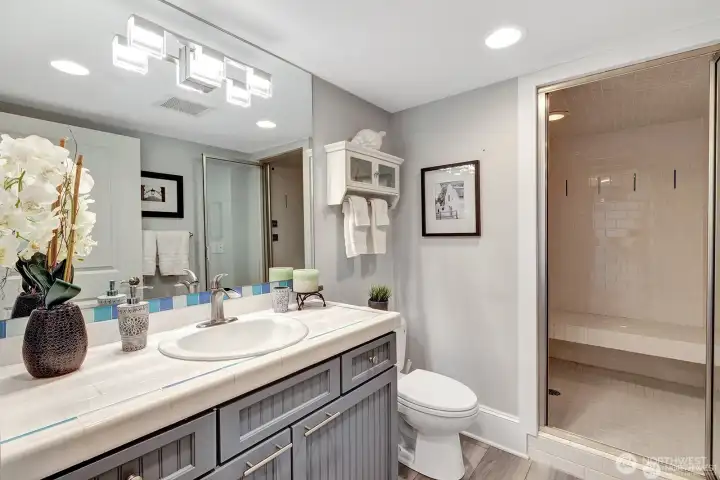 Bath with large walk in steam shower
