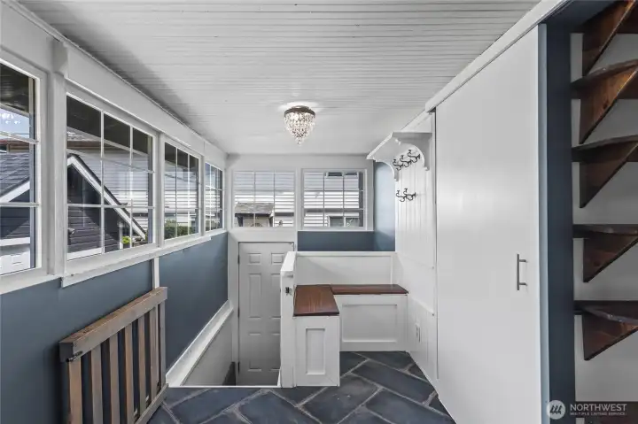 Back door entrance with additional bench seating and storage