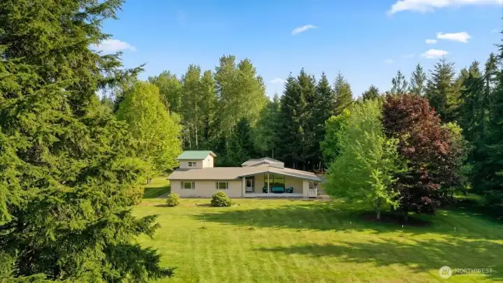 Homes covered patio, looking back across the pasture.