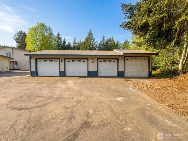 4 Car Garage, with Shop in Back.