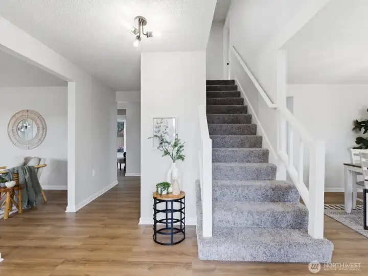The open entryway has plenty of room for guests shoes and coats. The open entryway has plenty of room for guests shoes and coats.