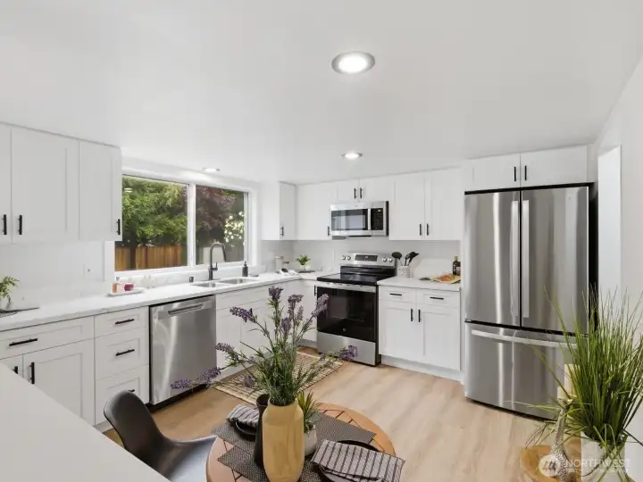 Stainless steel appliances, quartz counters and soft close cabinets finish this space beautifully! Stainless steel appliances, quartz counters and soft close cabinets finish this space beautifully!