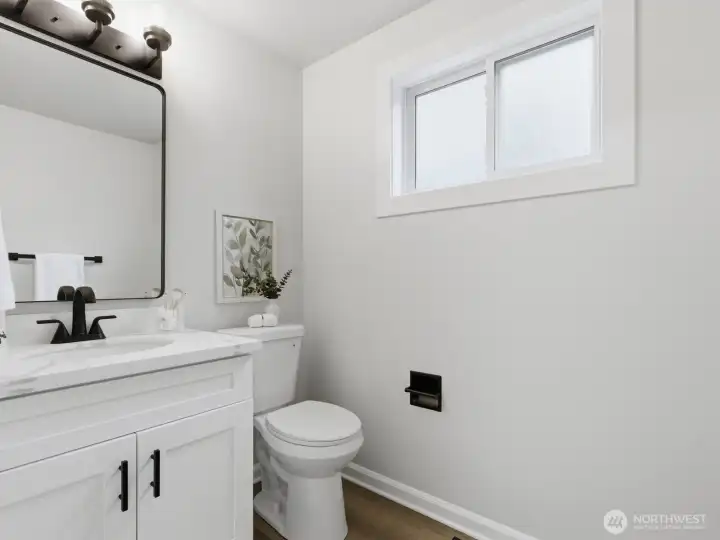 Nearby is the 1/2 bath- just inside the patio door for convenient access! Nearby is the 1/2 bath- just inside the patio door for convenient access!