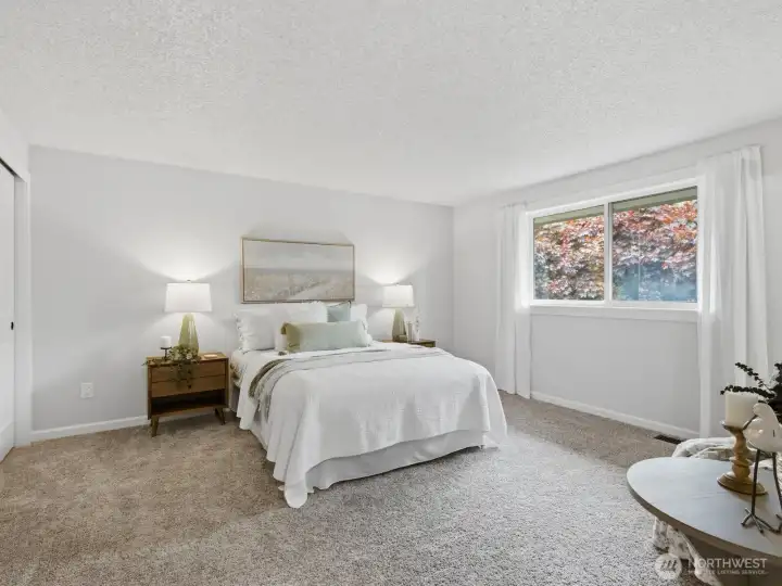 Just down the hall is the massive primary suite with 2 closets! Just down the hall is the massive primary suite with 2 closets!