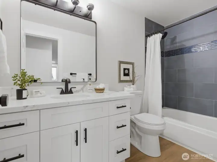 The full bathroom upstairs is another stunner! The full bathroom upstairs is another stunner!