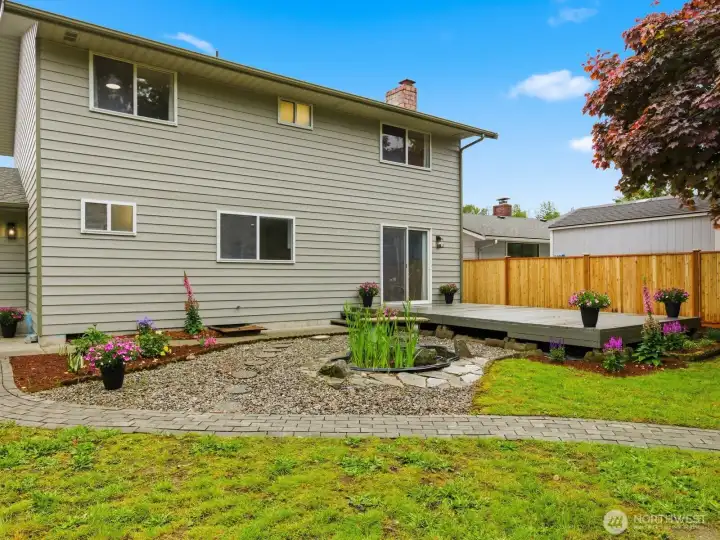 Paths throughout the yard make it easy to navigate the roomy backyard! Paths throughout the yard make it easy to navigate the roomy backyard!