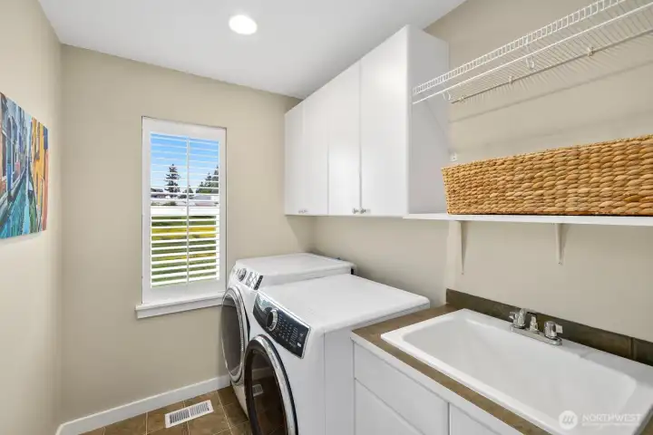 Upstairs laundry room.