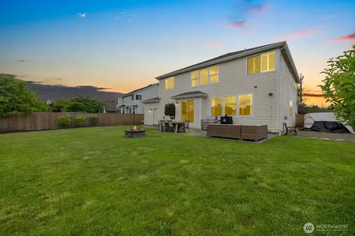 Lots of space for play, gardening, toys and more!