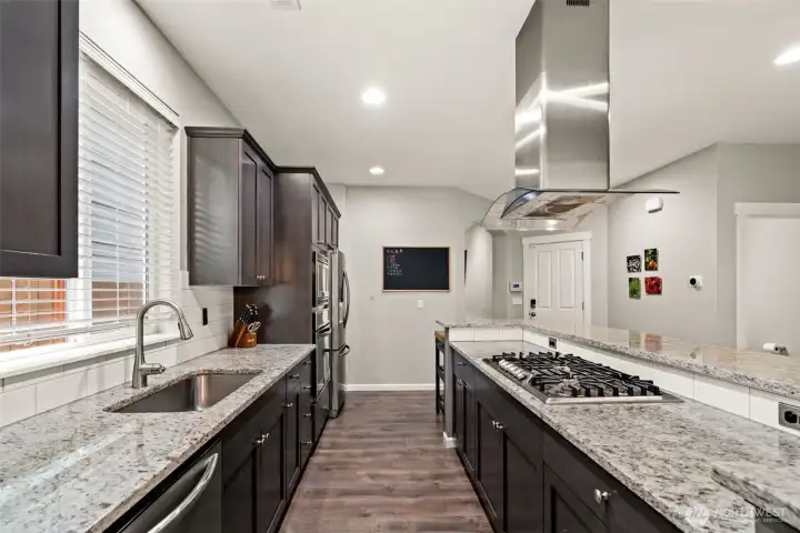 Granite counters, stainless appliances.