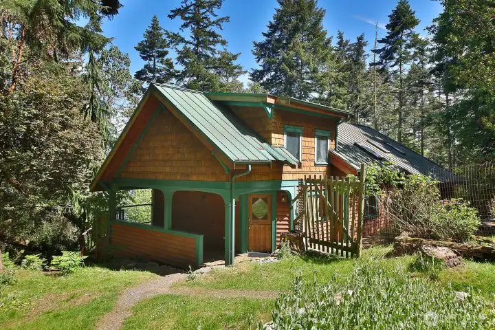 Covered porch entry. The main door is a Dutch door!