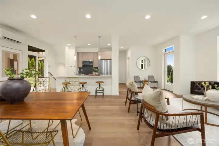 A comprehensive view of the main level, highlighting the sprawling floor plan, soaring ceilings, and incredible natural light.
