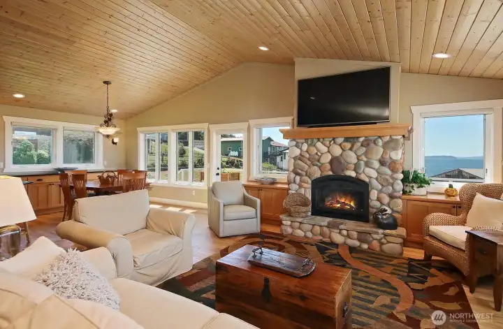 T&G vaulted pine ceilings. Rock propane fireplace. Water views.