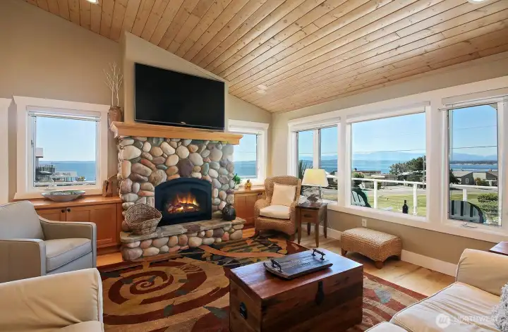 Picture windows capturing the views.