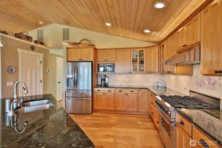 Granite countertops. Viking Stove. Maple cabinets.