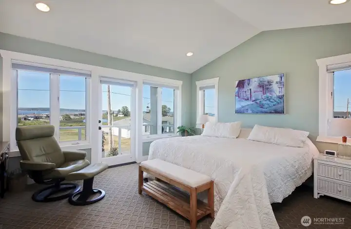 Primary Bedroom with private deck & fireplace.