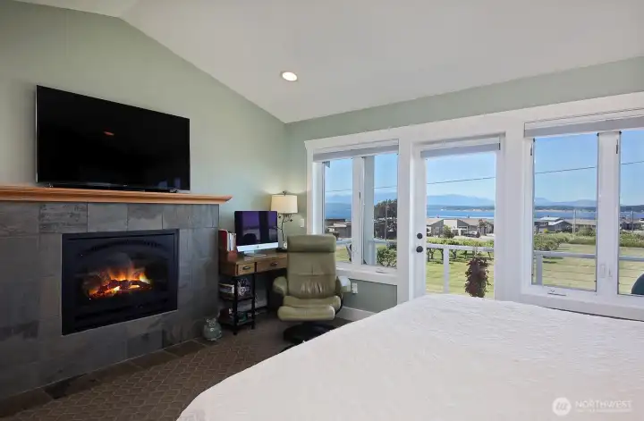 Primary bedroom with water view.