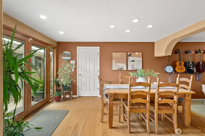 French doors lead out to the detached shop, paths leading to the creek, garden & outdoor kitchen French doors lead out to the detached shop, paths leading to the creek, garden & outdoor kitchen