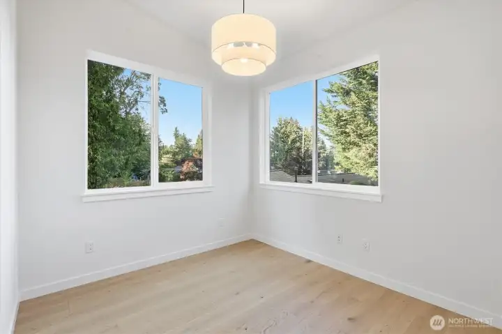 Third bedroom upstairs with vaulted ceilings. Third bedroom upstairs with vaulted ceilings.
