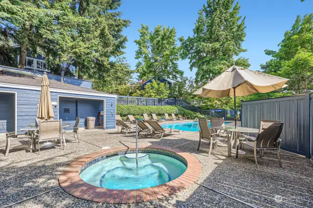 The commnity pool and hot tub includes a convenient pool house.